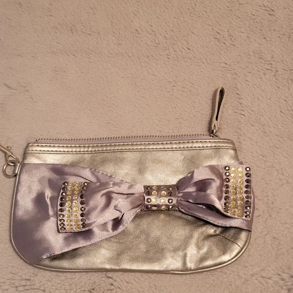 Candie's Silver Sequined Bow Wristlet - Picture 2 of 8